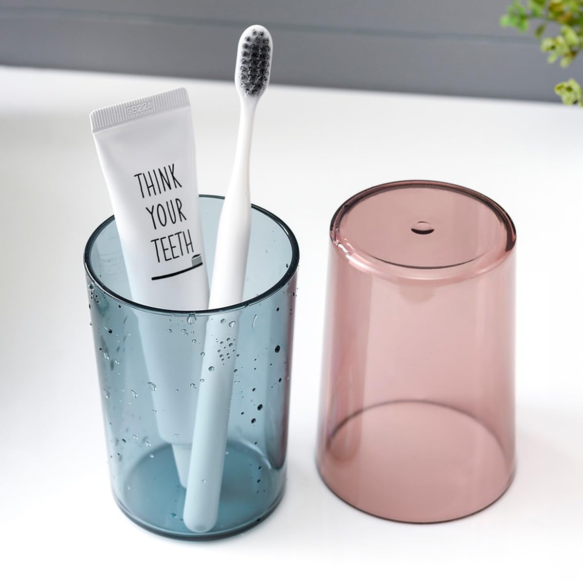 EZ LIVING Toothbrush Holder Cup Glass (Set of 2 Pcs) Plastic Stand for Toothpaste, Comb, Brush, Cream, Lotion Kids Bathroom Cup Waterproof, Transparent Red & Blue
